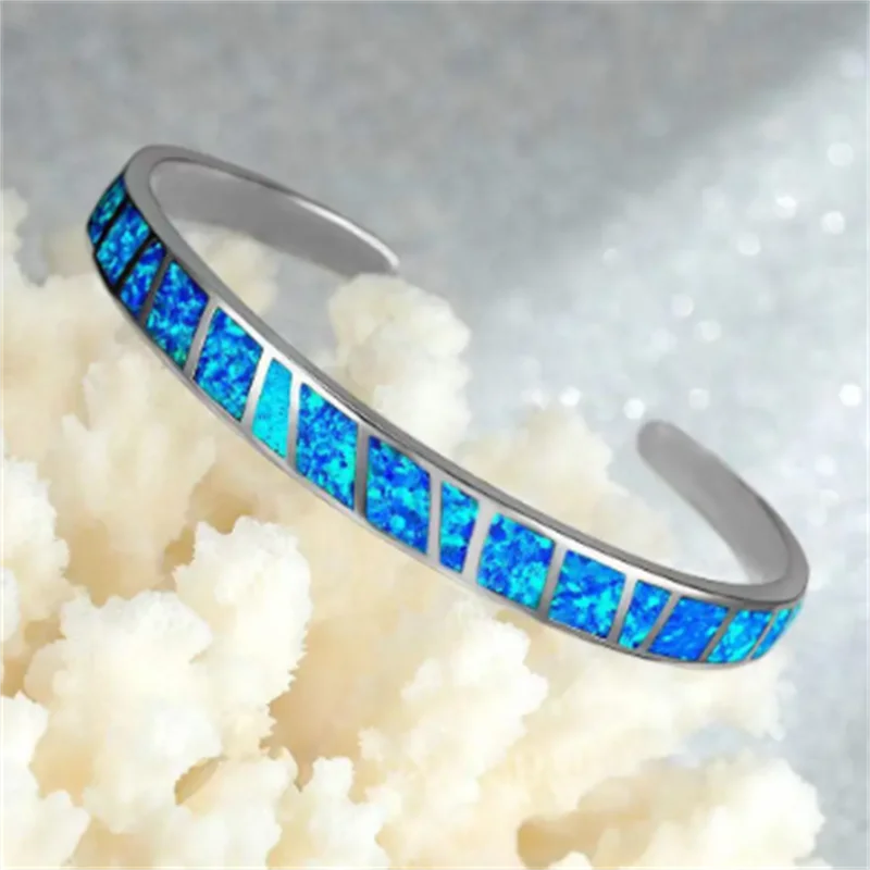 Justerbart Armbånd i Sølv med Blå Fire Opal