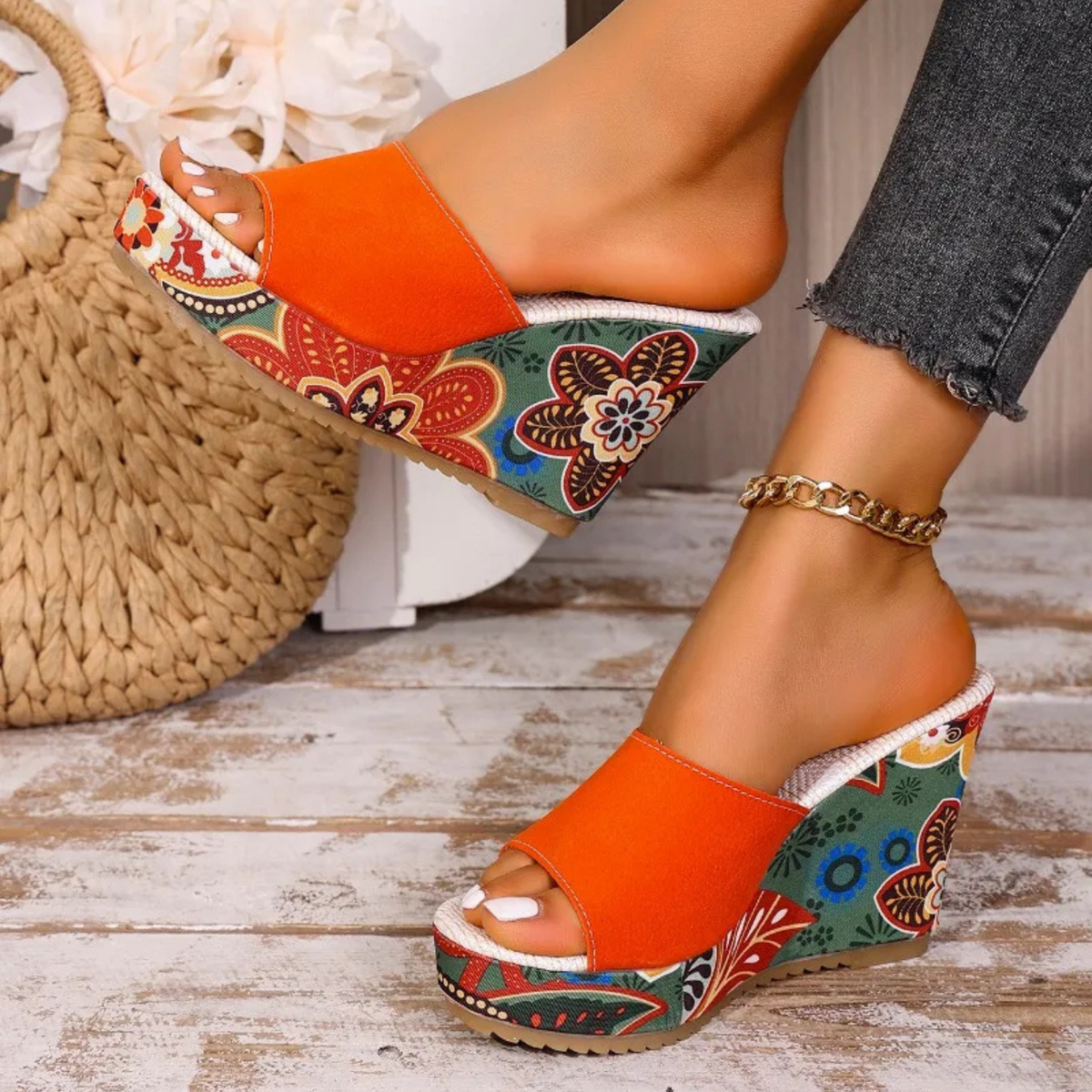Joelle™ — Skulpturelle mules med blomsterhæl
