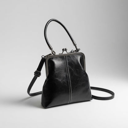 Honorine™ — Retro håndtaske med clipslukning og parisisk elegance