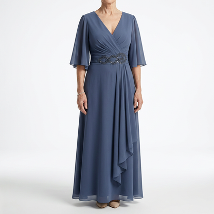 Éloïsine™ — Lang wrap-kjole med sommerfugleærmer og blød elegance