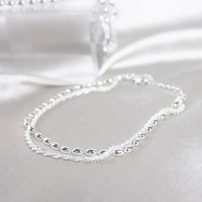 Elegant armbåndssæt i sølv med zirkonsten