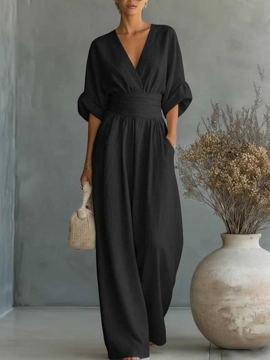 Elegant kjole med V-udskæring, åben ryg og flydende ærmer - Maison Claire et Sylvie