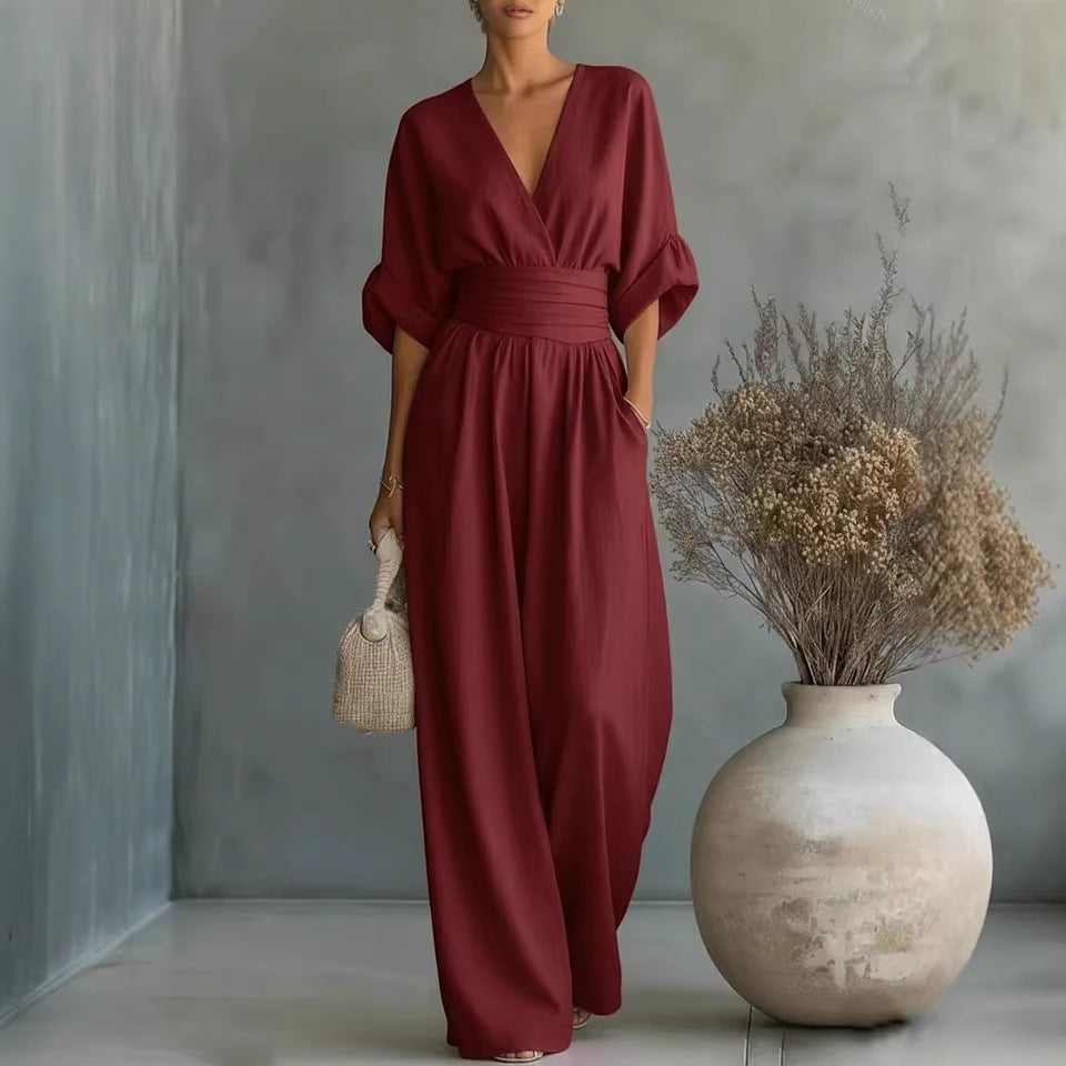 Elegant kjole med V-udskæring, åben ryg og flydende ærmer - Maison Claire et Sylvie