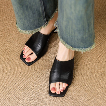 Virelle Curve mules i læder
