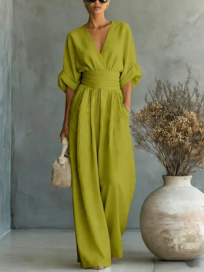 Elegant kjole med V-udskæring, åben ryg og flydende ærmer - Maison Claire et Sylvie