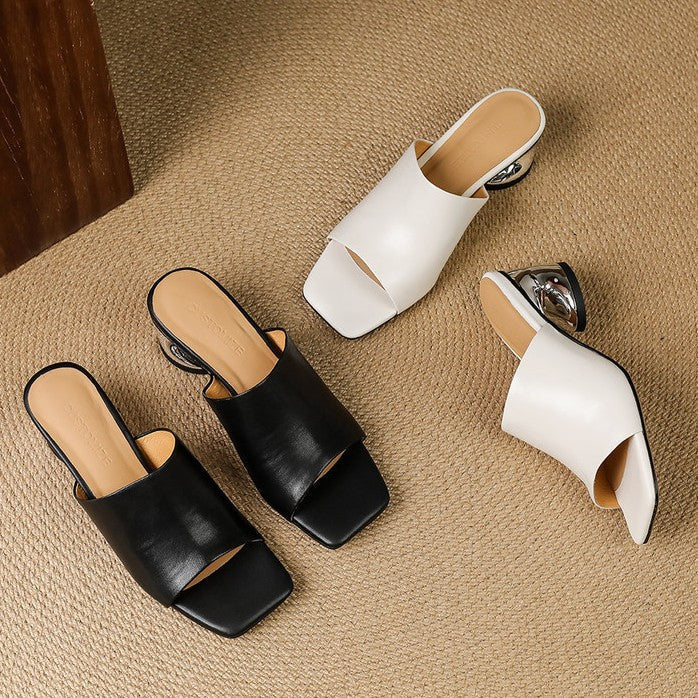 Virelle Curve mules i læder