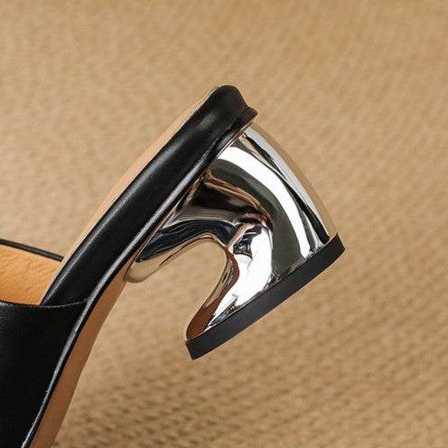 Virelle Curve mules i læder