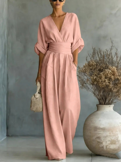 Elegant kjole med V-udskæring, åben ryg og flydende ærmer - Maison Claire et Sylvie