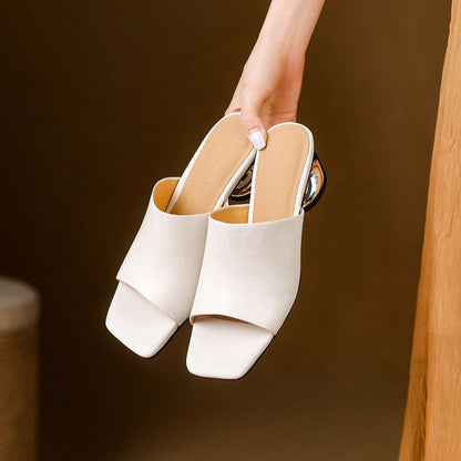 Virelle Curve mules i læder