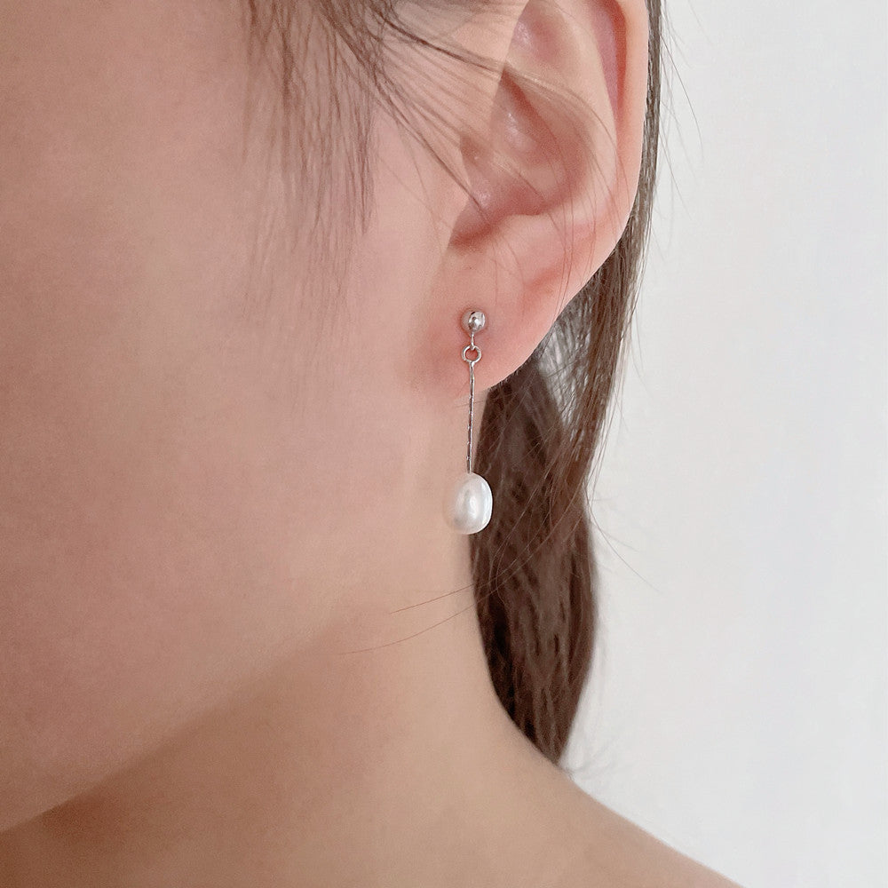 Øreringe med elegant perle