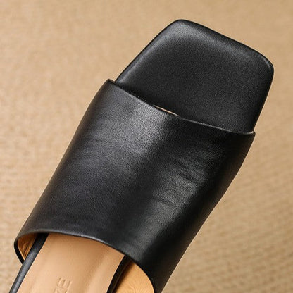 Virelle Curve mules i læder
