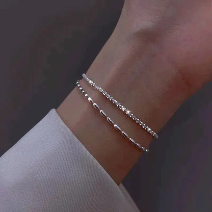 Elegant armbåndssæt i sølv med zirkonsten