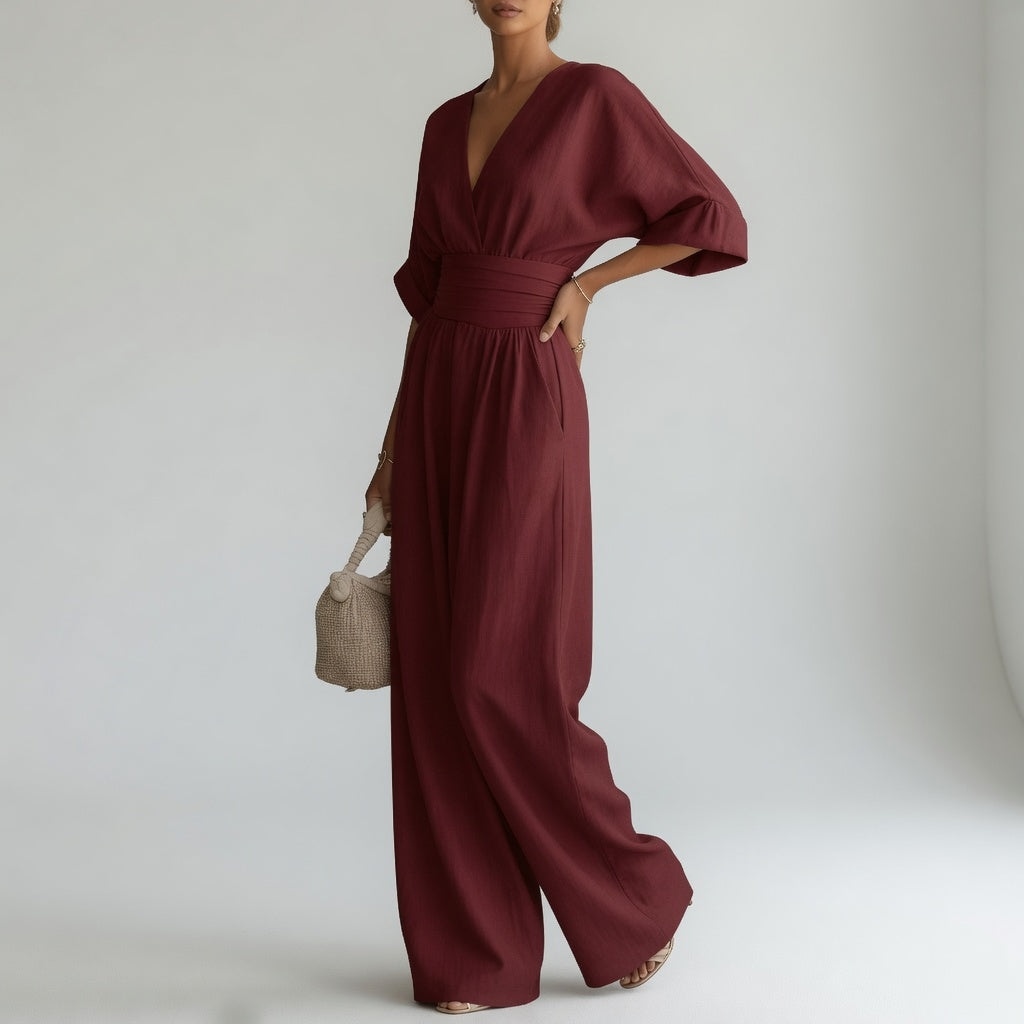 Blandine™ – Vid jumpsuit med V-hals og naturlig flydende elegance