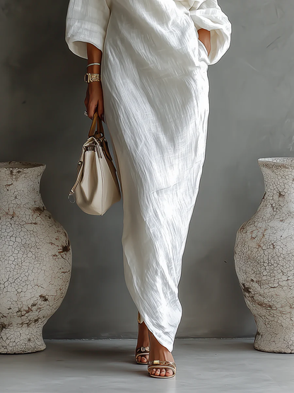 Livia™ — Asymmetrisk, flydende kjole med naturlig elegance