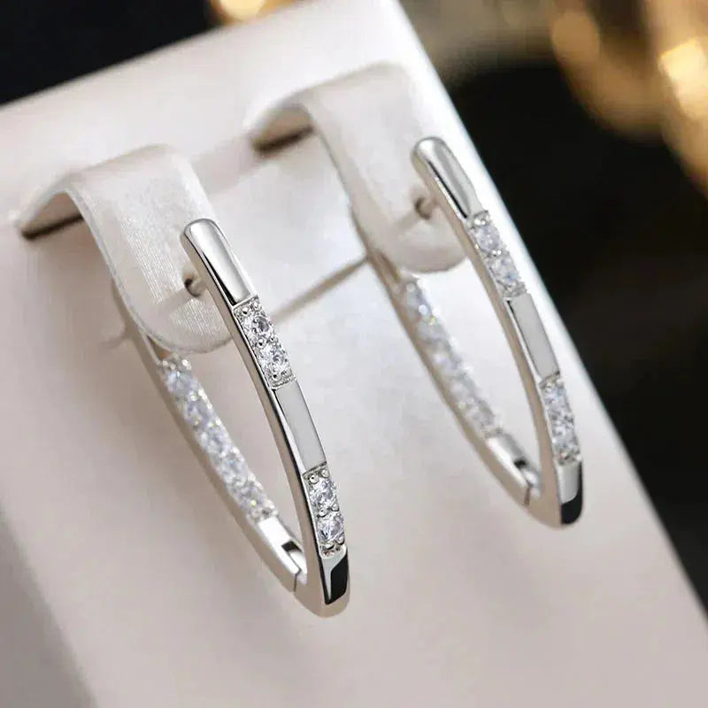 Elegante øreringe med zirkonia-sten