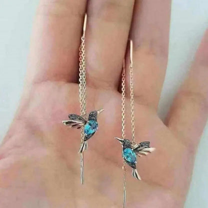 Øreringe med guldkolibri og krystaller